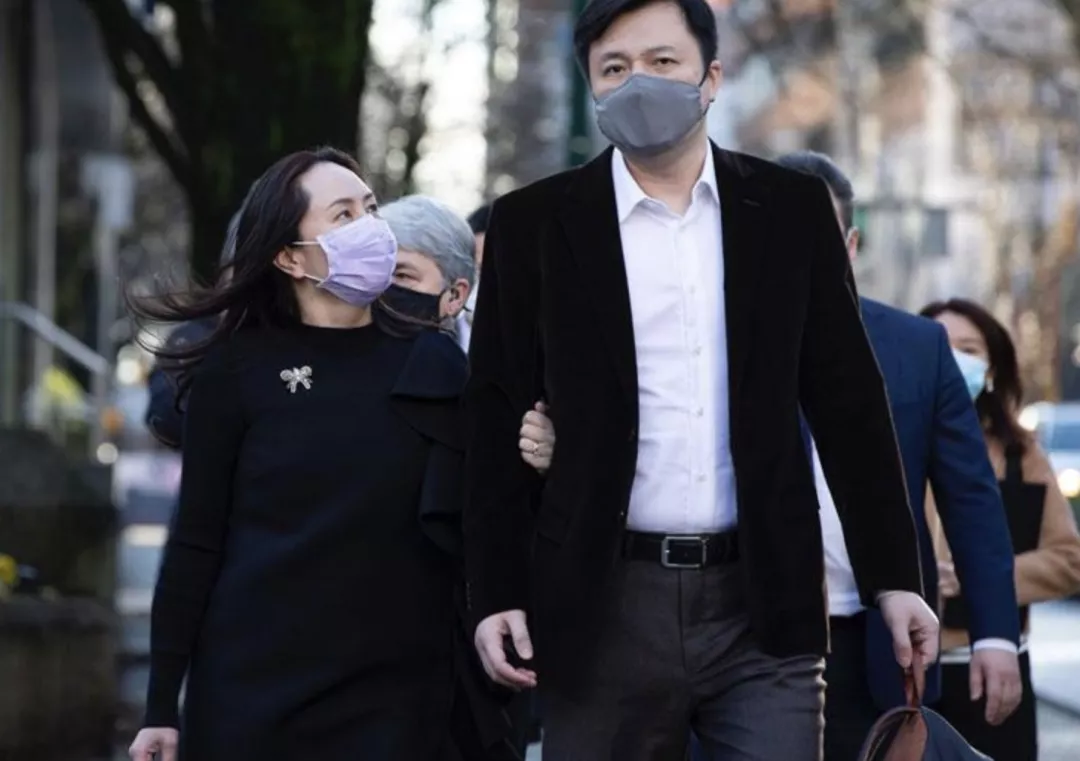 孟晚舟回國(guó)24小時(shí)后，她背后的男人火了